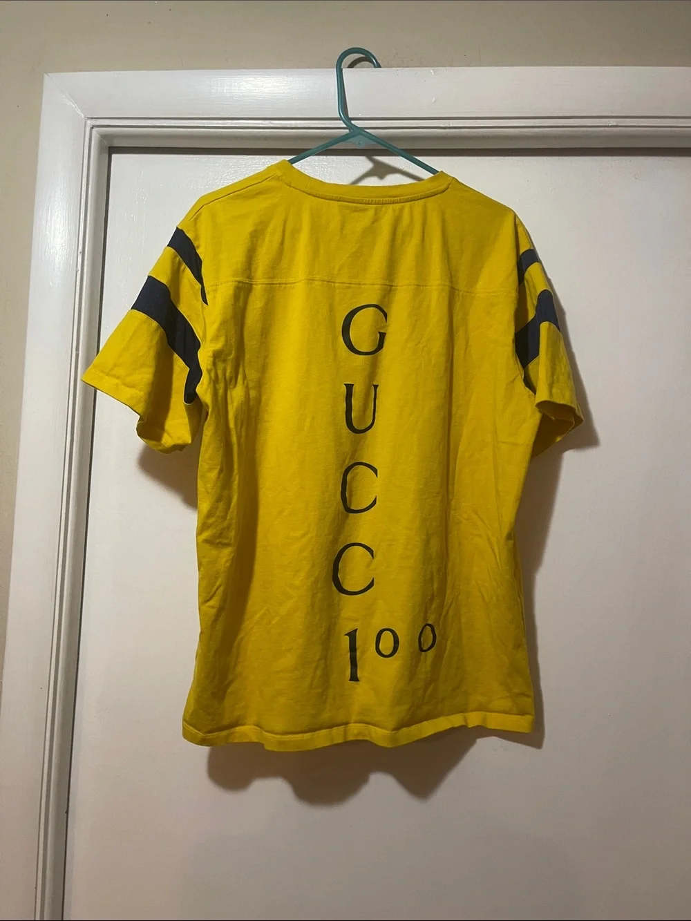 Gucci Yellow Graphic '22705 Songs' Tee with Blue Stripes large